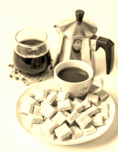 D e l i c i o u s   c o f f e e   s e r v e d   w i t h   s w e e t   p a s t r i e s   o n   a   c l e a n   t a b l e   s e t t i n g