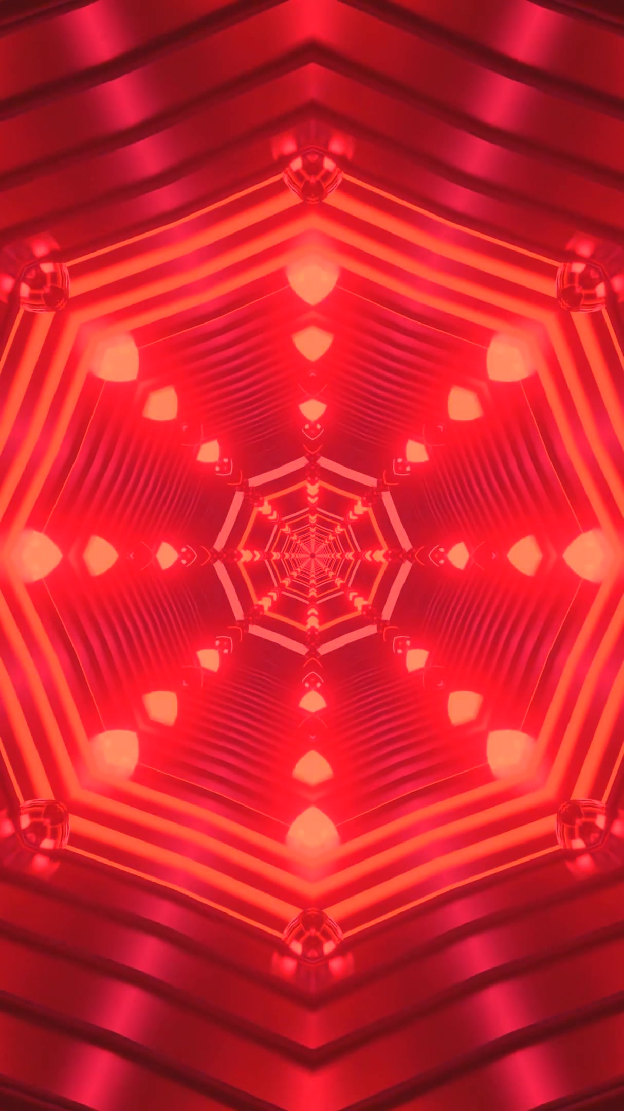 Seamless tunnel video loop featuring vibrant red patterns and shapes for mesmerizing visual effects