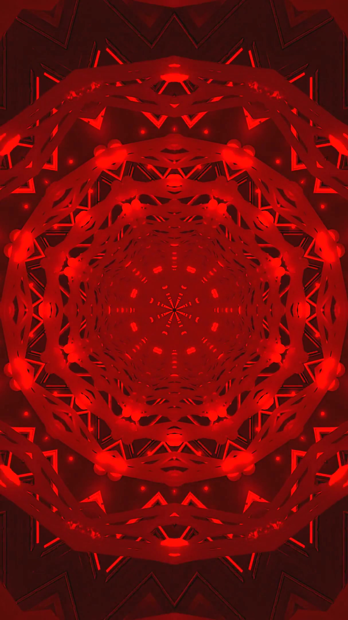 Dynamic tunnel video vj loop screensaver featuring vivid red patt