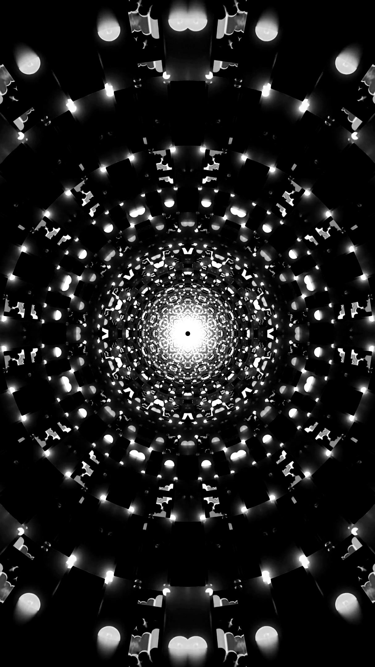 Experience a mesmerizing tunnel video vj loop screensaver that creates a seamless, captivating visual journey in black and white