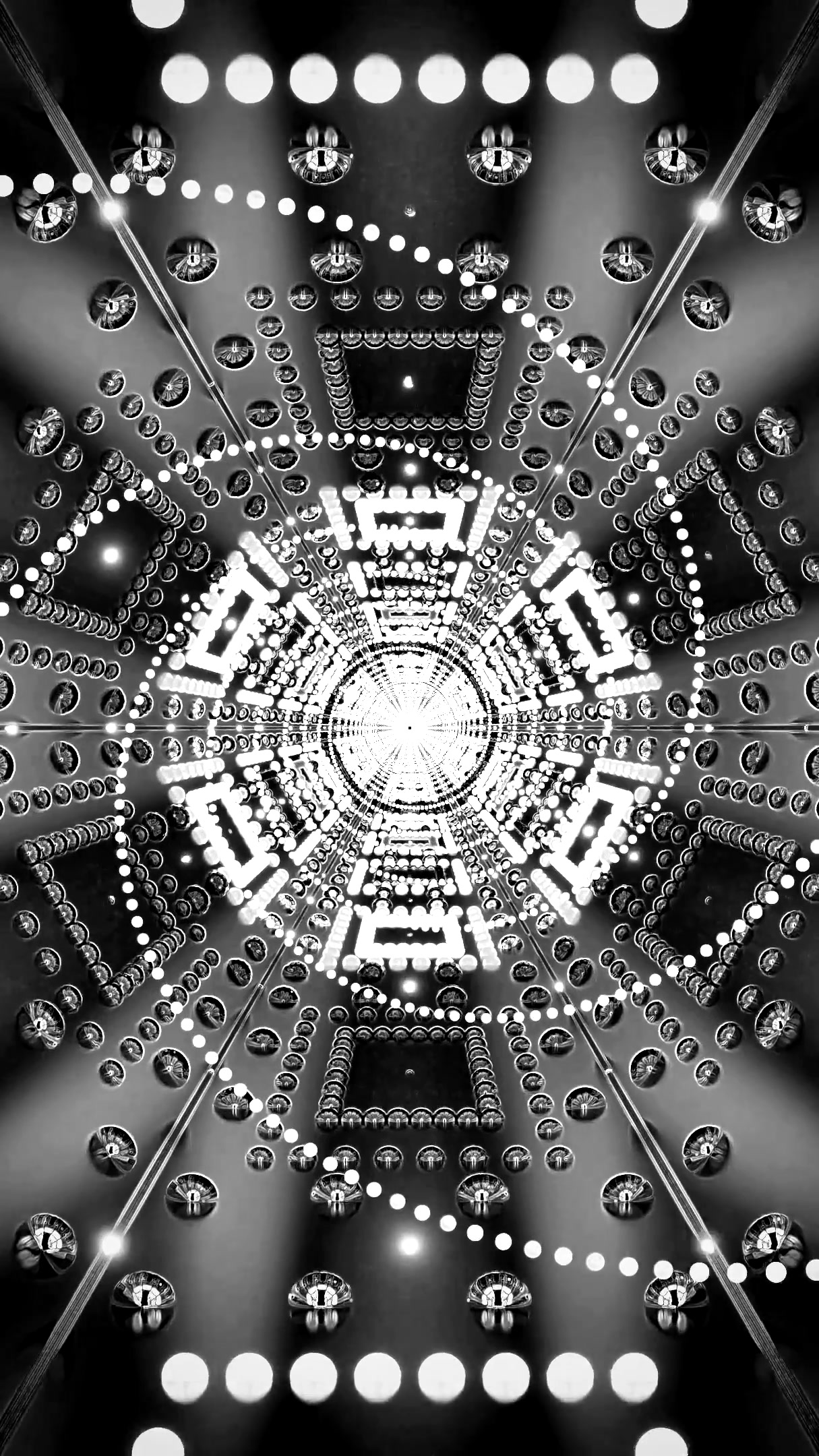 Endless tunnel video loop creates a mesmerizing visual experience in black and white with bright circular lights