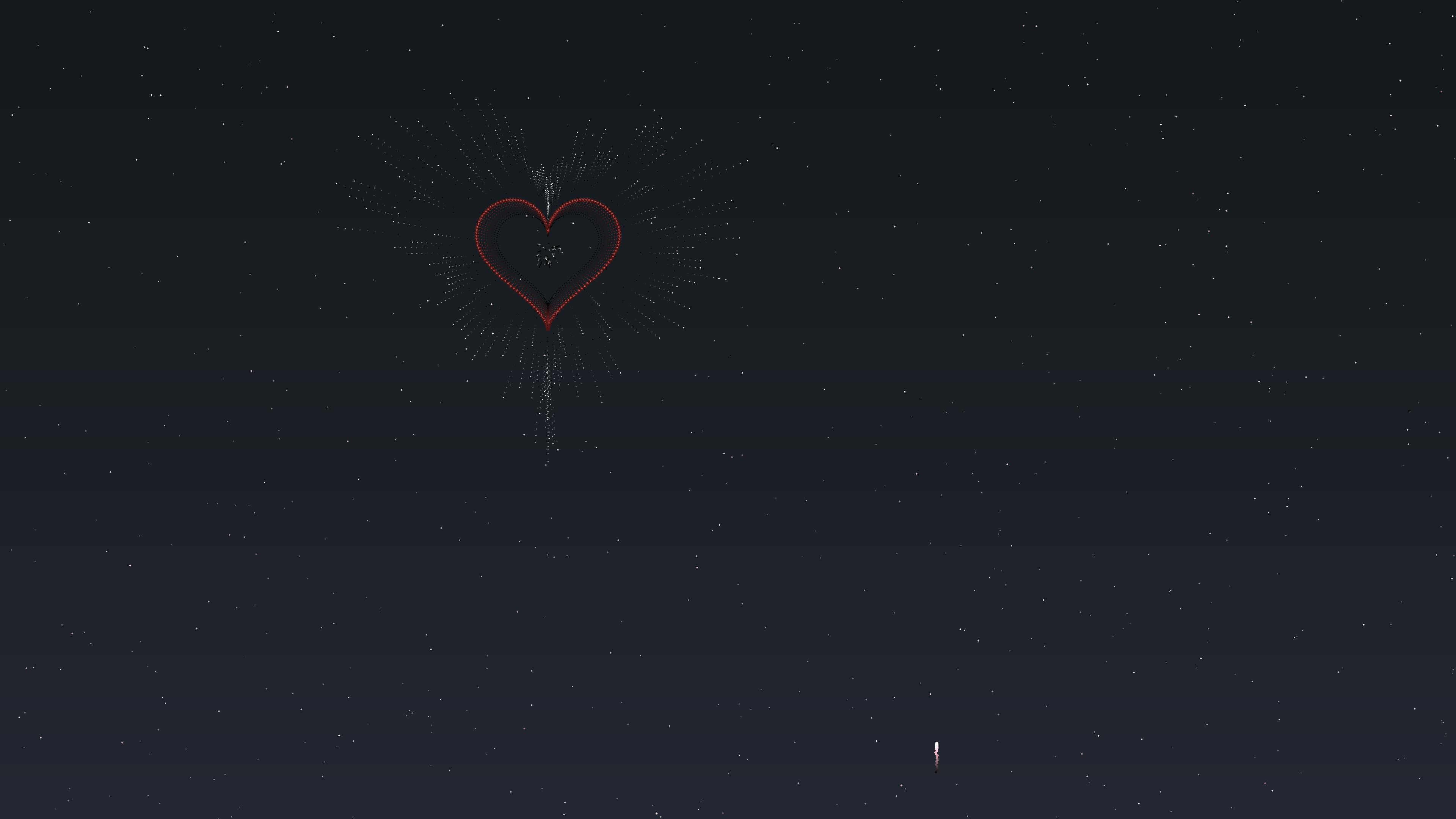 Fireworks light up the night sky during Valentines Day celebration with heart shapes exploding over the city