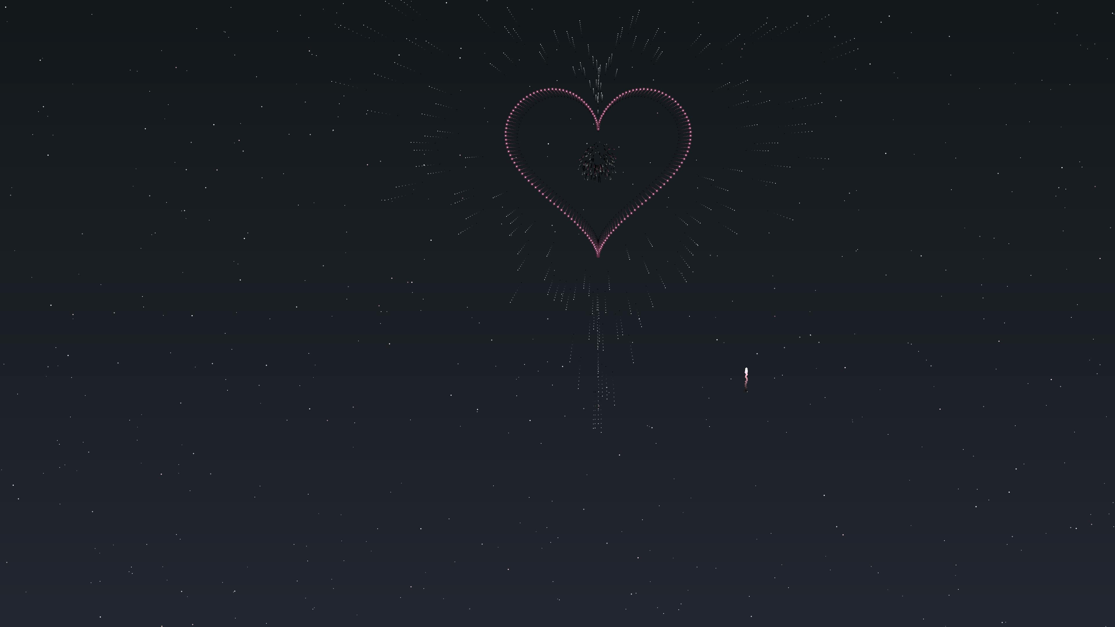 Valentines day fireworks display with heart shapes in the night sky during celebration time